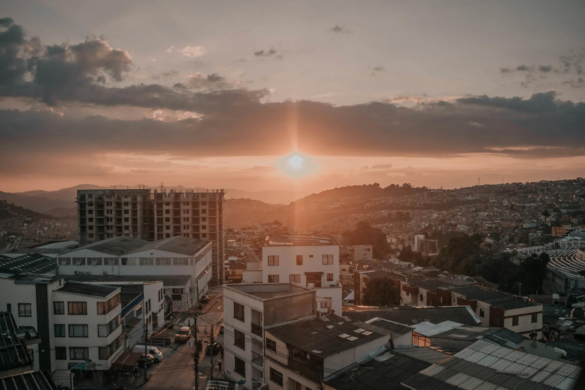 aerial view of city buildings during sunset